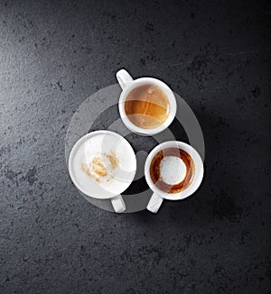 Cup of cappuccino, espresso macchiato and espresso photo