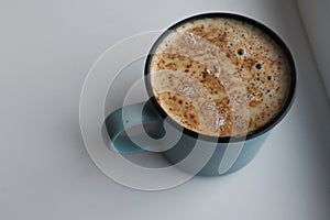Cup of cappuccino on a white background