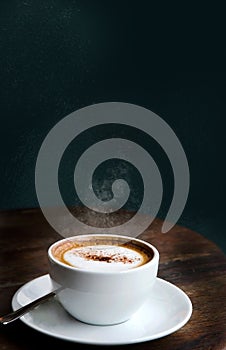 A Cup of Cappuccino on Wooden Table with Space for Text on Background