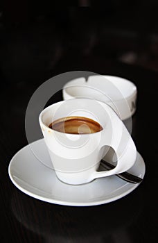 The cup of coffee in art deco style