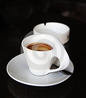 The cup of coffe in art deco style
