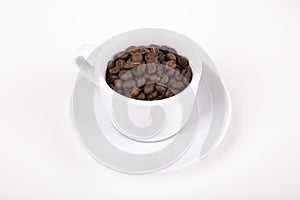 Cup of coffe with beans on white background