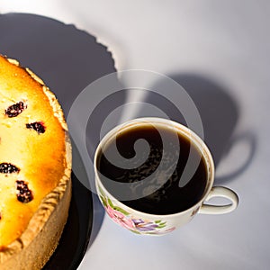 Cup of coffe with chesse cake