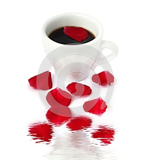 Cup of coffe with rose petal