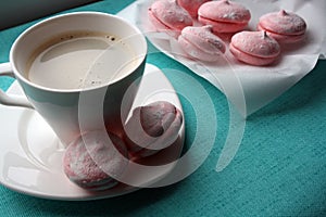 A cup of coffee and an airy apple marshmallow made according to the recipe