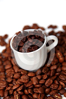 Cup with coffee beans