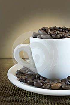 Cup with coffee beans