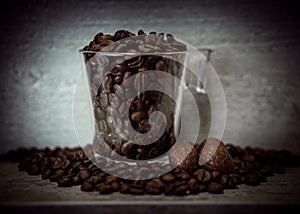 A cup of Coffee beans with chocolade