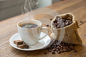 Cup of coffee and coffee-beans