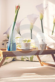 Cup of coffee in bed.