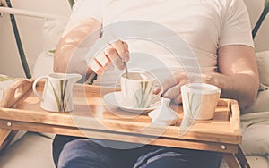 Cup of coffee in bed.