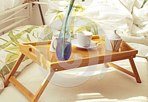 Cup of coffee in bed.