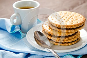 Cup of coffee with biscuits