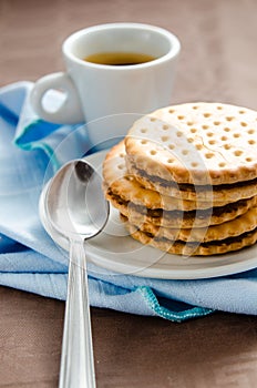 Cup of coffee with biscuits