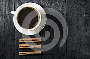Cup of coffee on wooden table