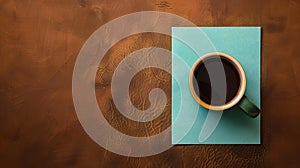 Cup of coffee on blue paper