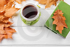 A cup of coffee and a book. Top view. The concept of autumn, still life, relaxation, study