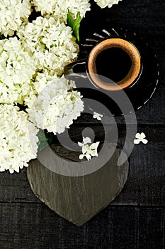 Cup of coffee with bouquet hydrangea Good morning. Flat