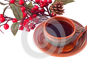 Cup of coffee and branch of hawthorn, breakfast background