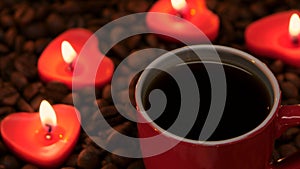 Cup coffee with candles in the shape of heart. Closeup