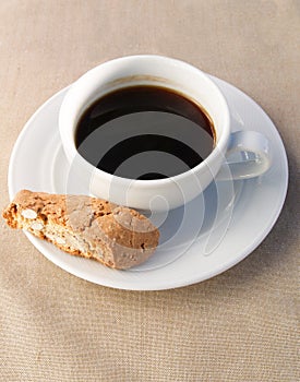 A Cup of Coffee with cantucci biscuits.