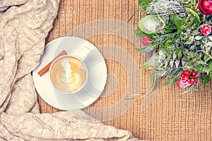 Cup of coffee or chai tea with latte art and Christmas decor. Le