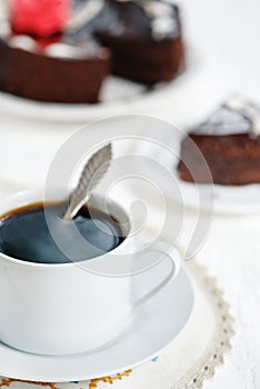 Cup of coffee and chocolate cake