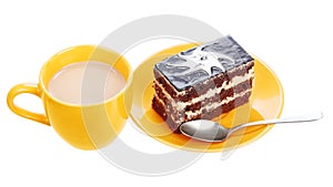 Cup of coffee and chocolate cake on orange plate