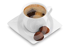 Cup of coffee and chocolate candy