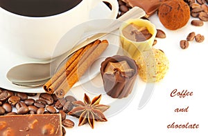 Cup of coffee with chocolates, coffee grains