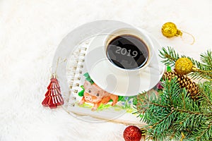 Cup of coffee on a christmas background. Christmas morning. Selective focus.