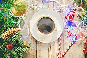 cup of coffee on a christmas background. Christmas morning. Selective focus.