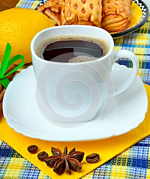 Cup of coffee cinnamon and star anise.