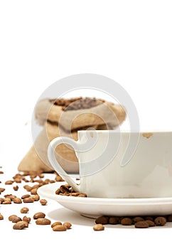 Cup of coffee with coffee beans