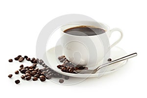 Cup of coffee with coffee beans isolated on a white