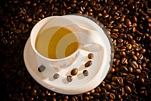 Cup of coffee and coffee beans