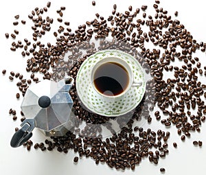 Cup of coffee, Colombian coffee beans on white background.