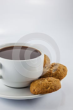 Cup of coffee and cookies on