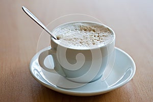 Cup of coffee with crema photo