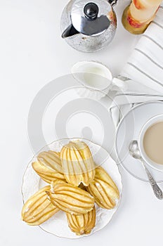 Cup of coffee and a eclairs for breakfast