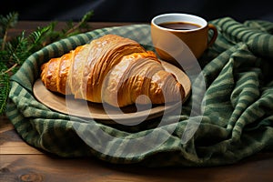 cup of coffee and freshly baked croissant in the morning light. Cozy Coffee and Pastry Moment