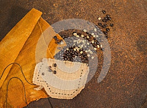 A cup of coffee full of raw and toasted coffee beans.