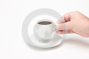 Cup of coffee with hand