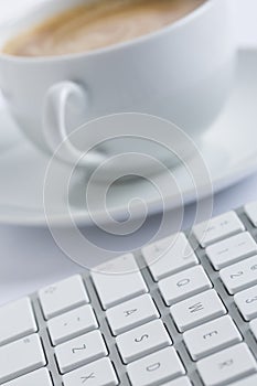 Cup of coffee with a keyboard