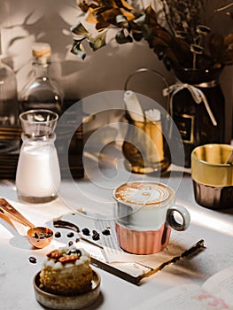 A cup of coffee lattee on the table