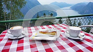 Cup of coffee and lemon pie on the table. Cafe on Mount Monte Bre. photo