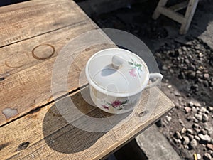 a cup with a coffee lid