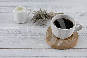 A cup of coffee and milk with caspia bouquet