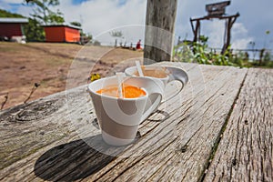 Cup of coffee,milk tea in wooden table background