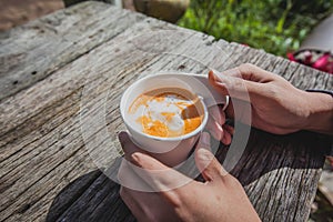 Cup of coffee,milk tea in wooden table background